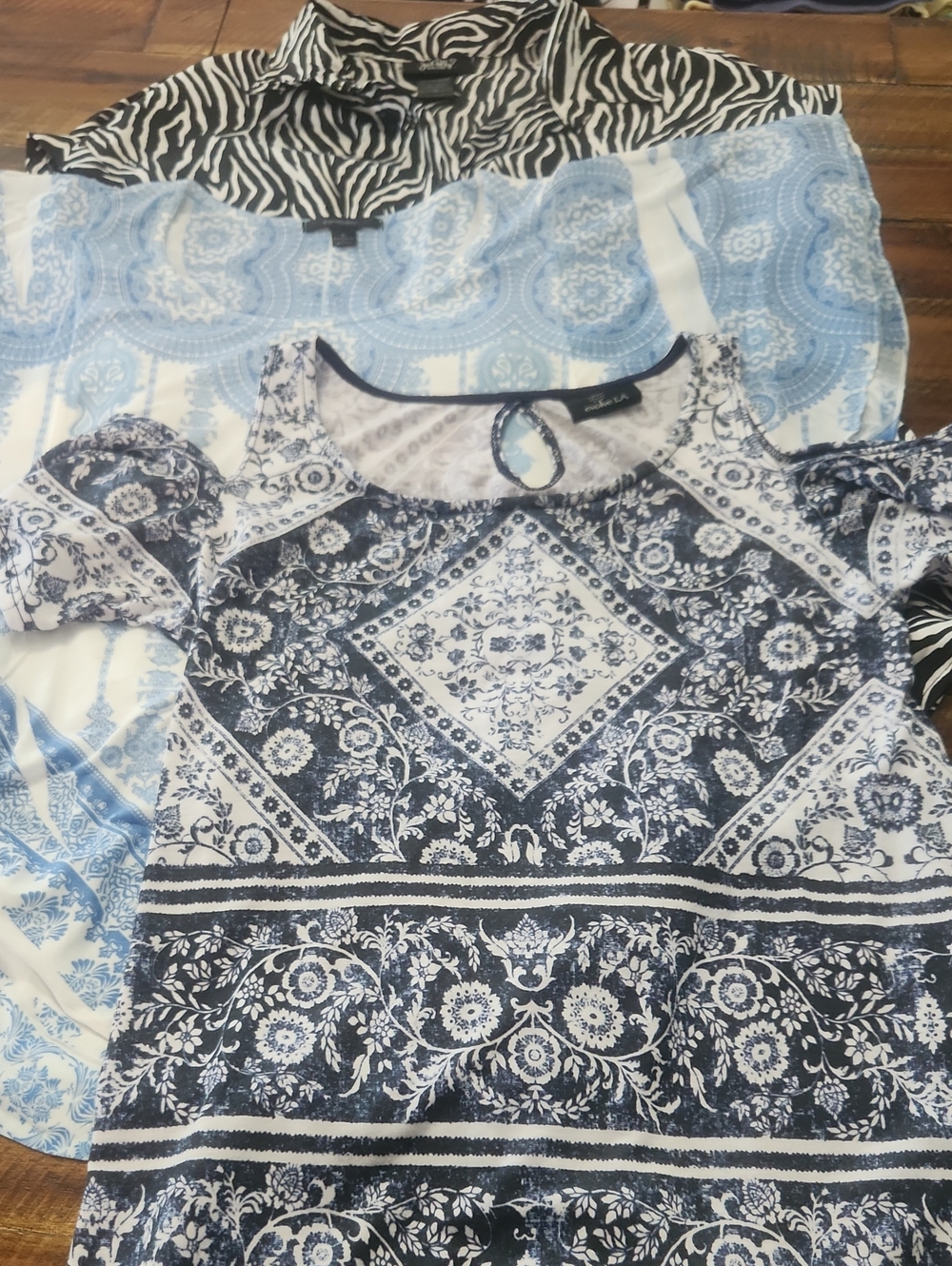 3 sized small tops
